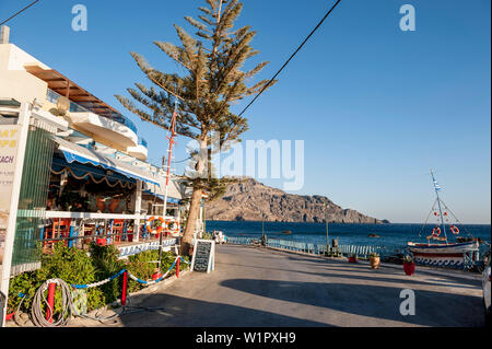 seafront in the evening with restaurant, Plakias, Crete, Greece, Europe Stock Photo