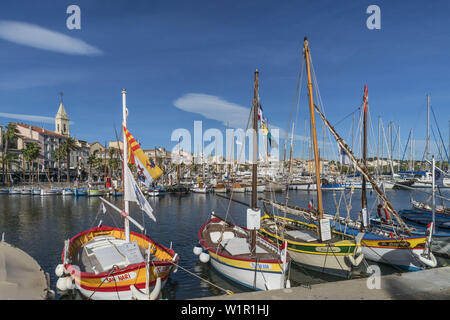 Mediterranean Fishing boats at Sanary-Sur-Mer , Promenade, Mistral Clouds, Cote d Azur, France Stock Photo