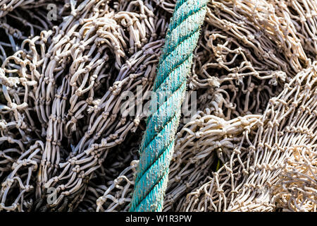 Fishing nets and a thick rope in the harbour, Port de Sóller, Mallorca, Spain Stock Photo