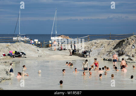 people taking sulfur mud bath, Vulcano Island, Aeolian Islands, Lipari Islands, Tyrrhenian Sea, Mediterranean Sea, Italy, Europe Stock Photo
