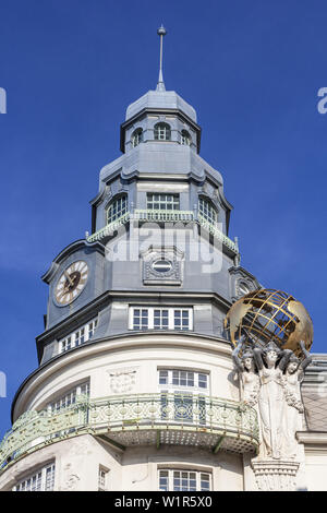 Sculpture with globe in front of palace Palais des Beaux Arts, Weißgerber district in Vienna, Eastern Austria, Austria, Europe Stock Photo