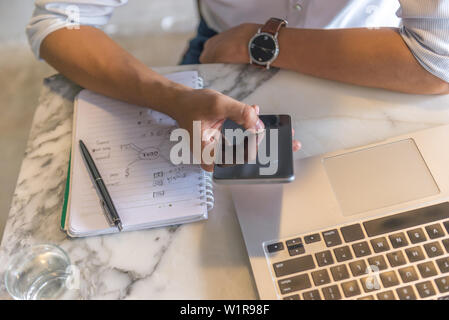 Close up photo of man using smartphone Stock Photo