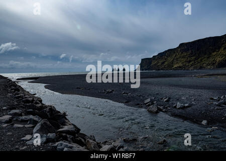 The black sand beach of Vik, Iceland on a cloudy spring day Stock Photo