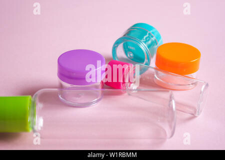 Travel size cosmetic and creams containers set.  Stock Photo