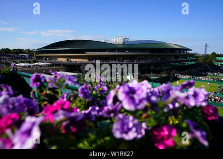 General view across the grounds towards court one and the new roof on day three of the Wimbledon Championships at the All England Lawn tennis and Croquet Club, Wimbledon. Stock Photo