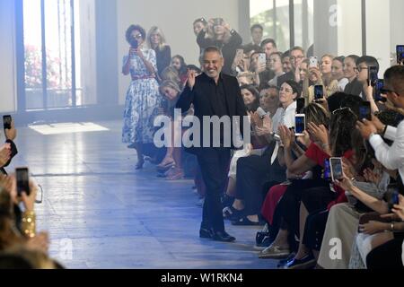 Paris, France. 3rd July, 2019. Designer Elie Saab salutes to audience after presenting his Fall/Winter 2019/20 Haute Couture collections in Paris, France, July 3, 2019. Credit: Piero Biasion/Xinhua/Alamy Live News Stock Photo