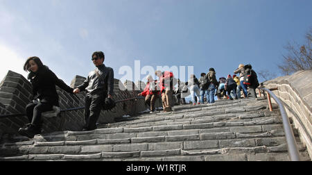 Great Wall of China at Juyongguan Beijing. Visitors walk on a steep section of the Great Wall of China at Juyongguan. Great Wall of China near Beijing Stock Photo