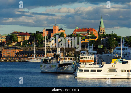 View of Soedermalm, excursion boats in the foreground, Stockholm, Sweden Stock Photo