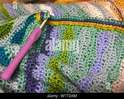 Crochet - work in progress on a crocheted blanket Stock Photo