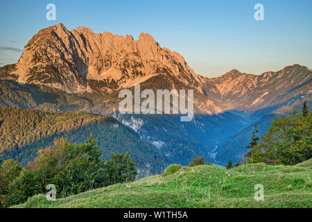 Wilder Kaiser in the dawn, from behind a mountain, Wilder Kaiser, Kaiser mountains, Tyrol, Austria Stock Photo