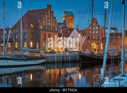 Wismar, old harbor with church St. Nikolai, Wassertor and Zollhaus, Mecklenburg Vorpommern, Germany Stock Photo