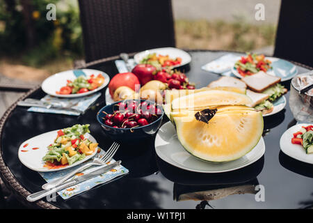 Selective focus of butterfly on yellow sweet melon Stock Photo