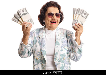 Cheerful elderly woman holding bunches of money and smiling isolated on white background Stock Photo