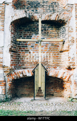 The ruins of Chapel of the XXII century, located in Loshitsky park, Belarus. The walls look mysterious. Stock Photo