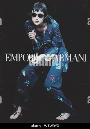 poster advertising Emporio Armani by Giorgio Armani female model