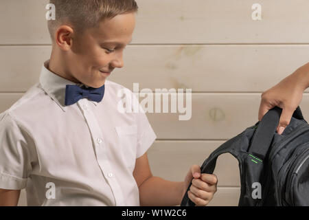 A 10-year-old boy prepares for school after a long summer break. Back to school Stock Photo