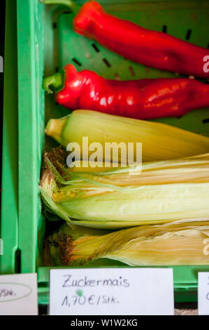 corn on the cob, peppers being sold in the farm shop, farmer, organic, agriculture, farming, Bavaria, Germany, Europe Stock Photo