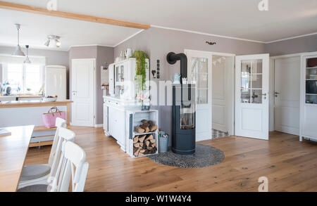 Modern Nordic Living room in family house with white and gray furniture and wooden floor, Korbach, Hesse, Germany, Europe Stock Photo