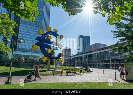 Frankfurt, Germany. July 2019.  the monument of the euro symbol in front of the Eurotorre building Stock Photo