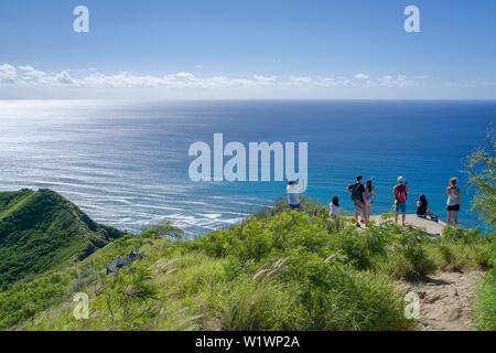 Tourists hike to top of Diamond Head to see old artillery bunkers of view of Waikiki. Stock Photo