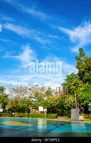 Outdoor basketball court floor polishing smooth and painted well protection in the park Stock Photo
