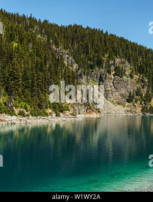 view at Garibaldi lake beautiful sunny morning with clouds on bluew sky. Stock Photo