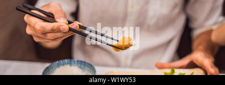 Bento set of prawn tempura and chicken teriyaki in japanese restaurant BANNER, LONG FORMAT Stock Photo