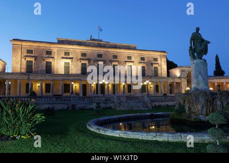 Illuminated Palace St. Michael and St. George, also Old Palace, in front Sir Frederic Adam Statue, Dusk, Corfu City, Island Corfu, Ionian Islands Stock Photo