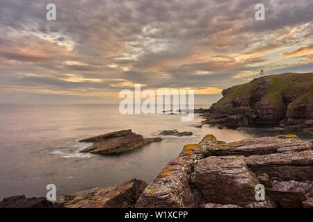 Stoer Head Lighthouse, Stoer Peninsular, Assynt, Sutherland, Highland, Scotland. At sunrise Stock Photo