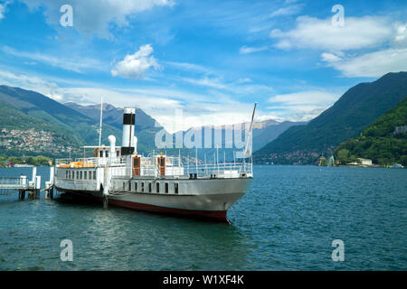 Beautiful white vintage ferry on Lake Como in Italy. Stock Photo