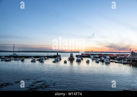 Ballycotton, Cork, Ireland. 04th July, 2019. A calm summer morning before dawn at Ballycotton Harbour in Co. Cork, Ireland. Credit: David Creedon/Alamy Live News Stock Photo