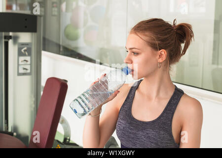 Beautiful Teen Girl Drinks Clean Water From A Plastic Bottle On A Hot  Summer Day Selective Focus Stock Photo - Download Image Now - iStock