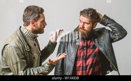 Men failed deal argue. Failure and disappointment. Disappointed partner argue. Showdown concept. Conflict and confrontation. Man argue while guy feel sorry. Fail and misunderstanding. Feel guilty. Stock Photo