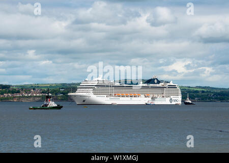 Cruise ship MSC Orchestra at anchor in the Firth of Forth at Queensferry, Scotland, UK Stock Photo