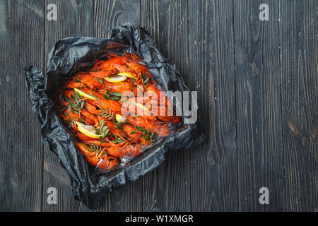 Top view of box with boiled crawfish Stock Photo
