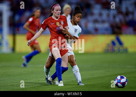 LYON, FRANCE - JULY 02: Rose Lavelle of the USA (L) and Lucy Bronze of England competes for the ball during the 2019 FIFA Women's World Cup France Semi Final match between England and USA at Stade de Lyon on July 2, 2019 in Lyon, France. (Photo by David Aliaga/MB Media) Stock Photo