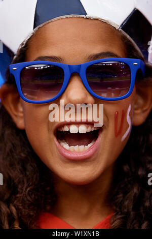 a-fan-cheers-prior-to-the-world-cup-group-f-soccer-match-between