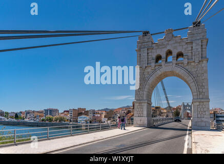 Puente Colgante Amposta aka Pont Penjant Amposta, suspension bridge over Ebro river in Amposta, Catalonia, Spain Stock Photo