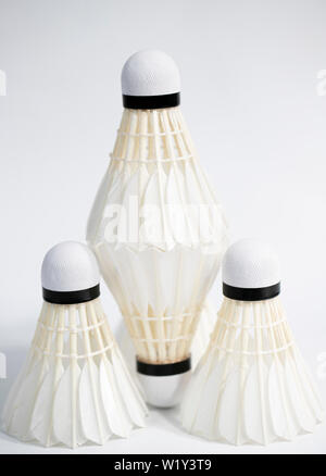 white badminton shuttlecocks lay on white table background Stock Photo