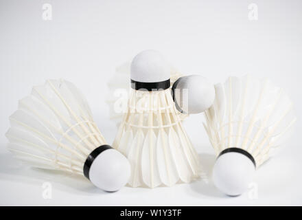 white badminton shuttlecocks lay on white table background Stock Photo