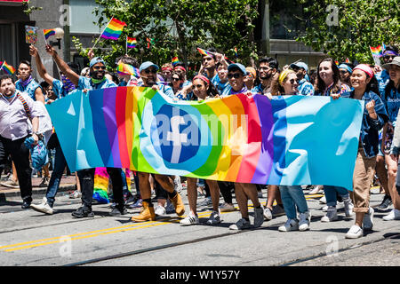 June 30, 2019 San Francisco / CA / USA - Facebook employees and representatives taking part at the SF Pride Parade in downtown San Francisco Stock Photo