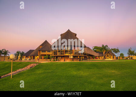 Sunrise above a luxury game lodge near the Kalahari desert in Namibia Stock Photo