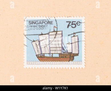 SINGAPORE - CIRCA 1986: A stamp printed in Singapore shows a Jiangsu Trader, circa 1986 Stock Photo