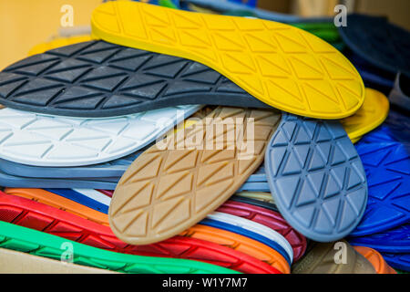 close up of pile of colorful rubber shoe soles Stock Photo