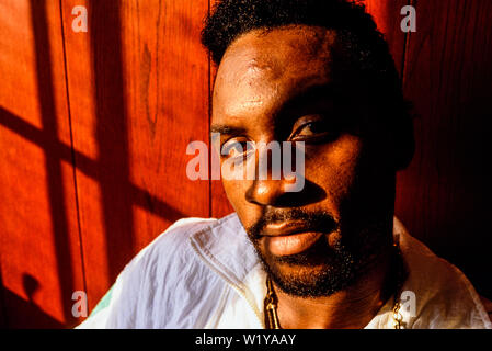 London, 1990. Portrait of boxer Nigel Benn. Nicknamed The Dark Destroyer, he held the WBO middleweight title in 1990, and the WBC super-middleweight t Stock Photo
