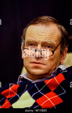 Cambridge, June 1991. Portrait of Jeffrey Archer, author and politician, at home at The Old Vicarage, Grantchester, Cambridge. Hi is waering a paisley Stock Photo