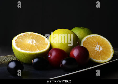 Sweet lemon, a citrus fruit with ripe plum fruits for a healthy diet Stock Photo