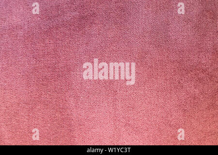 The structure of purple velor fabric. Modern upholstered velvet furniture. Creative vintage background. Quilted fabric Stock Photo