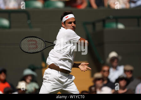 LONDON, ENGLAND - JULY 04: Roger Federer of Switzerland in action during his men’s singles second round match on during Day Four of The Championships - Wimbledon 2019 at All England Lawn Tennis and Croquet Club on July 04, 2019 in London, England. Stock Photo