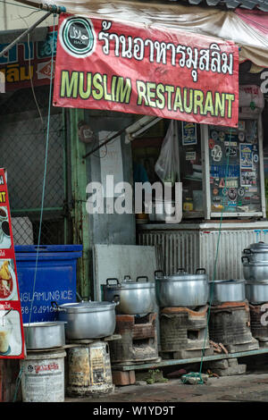 PATTAYA, THAILAND, APR 29 2018, Sign with text of a muslim restaurant in Pattaya city street. Offer of Halal food in Thailand. Stock Photo